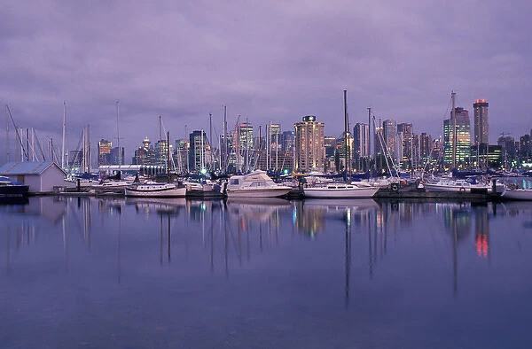 Canada, Vancouver B. C. city skylineand marina from Stanley Park at dusk