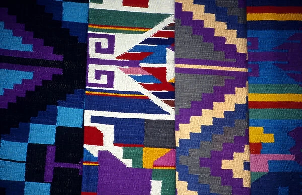 Central America, Guatemala, Antigua. Colorful woven textiles of Guatemala