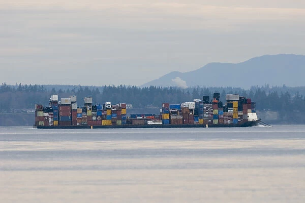 Colorful load on barge in Admiralty Inlet between Whidbey Island and Olympic Peninsula