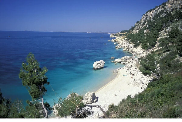Europe, Albania. Coastal road South of Valona. White sand beach and crystal clear