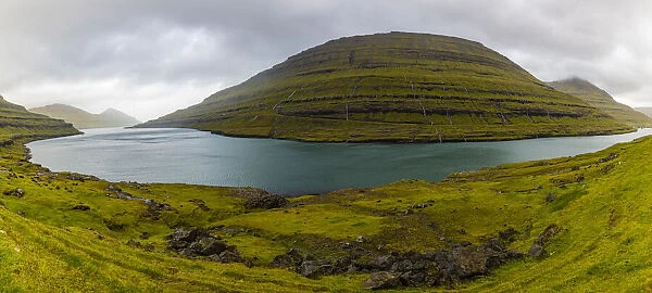 Europe, Faroe Islands. Panoramic view of the fjord at Funningsfjordur on the island of
