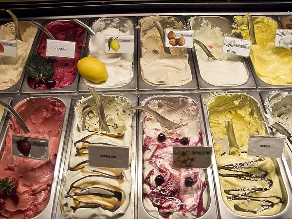 Europe, Italy, Parma. Many flavors of gelato for sale