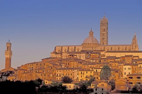 Europe, Italy, Tuscany, Siena. 13th century Duomo & Palazzo Pubblico. Sunset