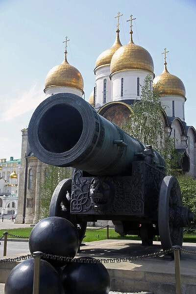 Europe, Russia, Moscow. The Czar Cannon at the Kremlin, with Dormition Cathedral