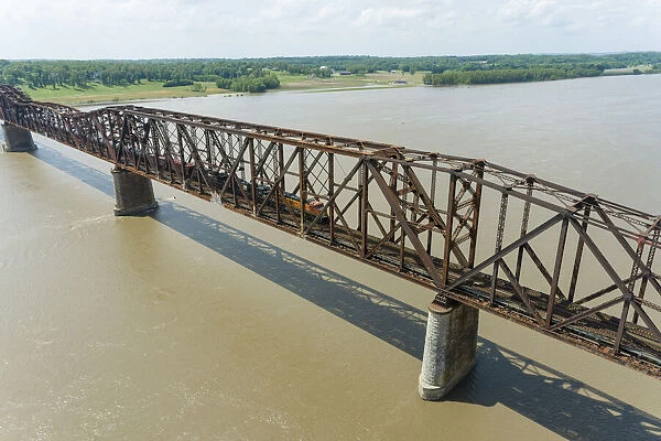 Freight train on Union Pacific railroad crossing the Mississippi river on the Thebes