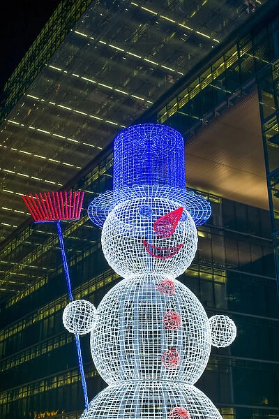 Germany, Berlin, Charlottenburg, Kurfurstendam, Neus Kranzler Eck building and Christmas snowman
