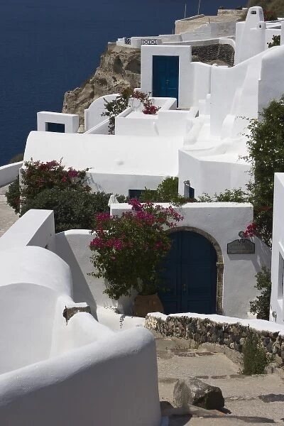 Greece, Santorini, Thira, Oia. White villas with blue doors