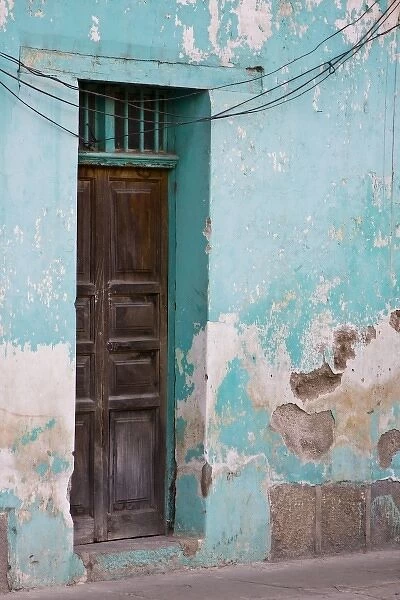 Guatemala, Antigua. Wooden door entryway of home in the town of Antigua