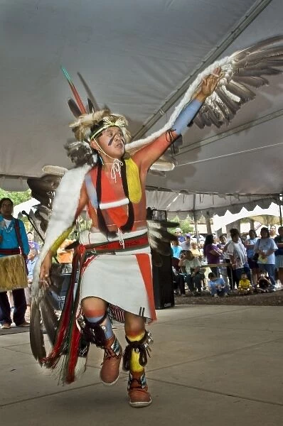 Hopi eagle dancer, Alrye Polequaptwa, dressed in traditional regalia of woven apron