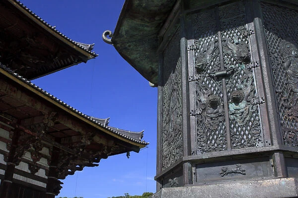 An intricate metal lantern at the entrance to Daimonji Temple, home to the giant