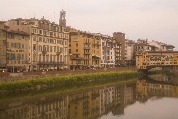 Italy, Florence. Buildings reflect in the Arno River