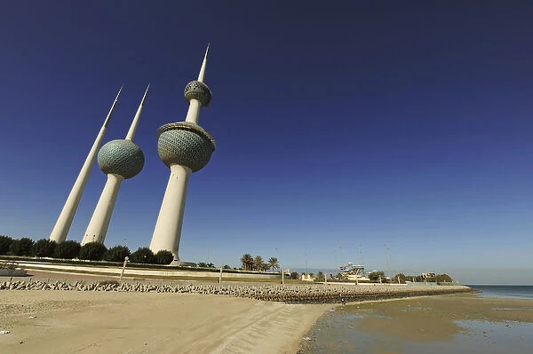 Kuwait, Kuwait City, Kuwait Towers along small beach