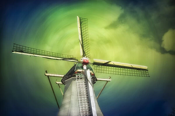A lone windmill stands against the blue-green sky and clouds in swirl pattern
