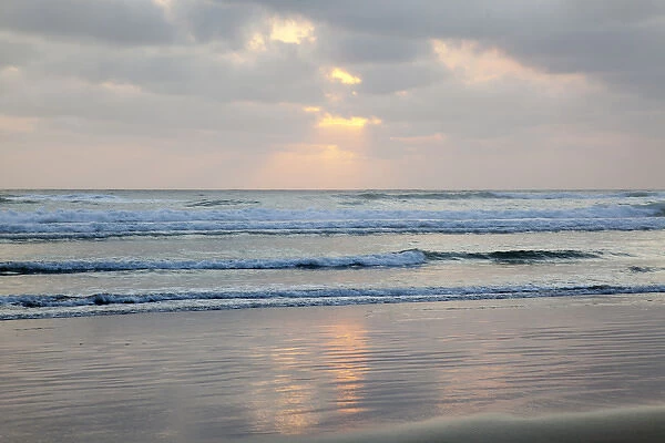 OR, Cannon Beach, ocean waves at sunset