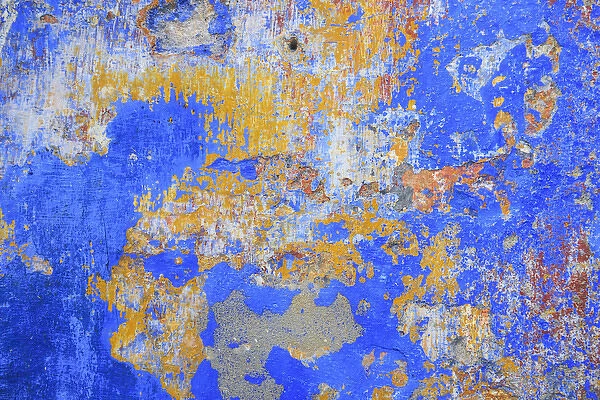 Detail of a painted retaining wall on the main shopping street in Obidos