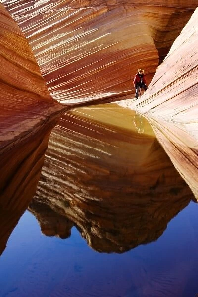 A photographer at the Wave in the Paria Canyon-Vermilion Cliffs wilderness area (MR)