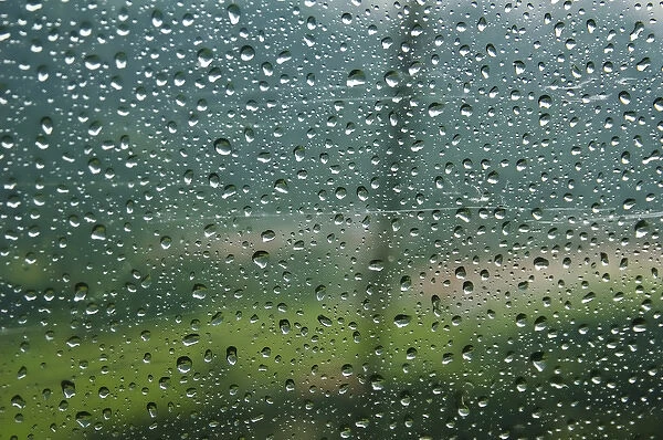 Rain drops on a cable car going up the mountains in the Bavarian Alps