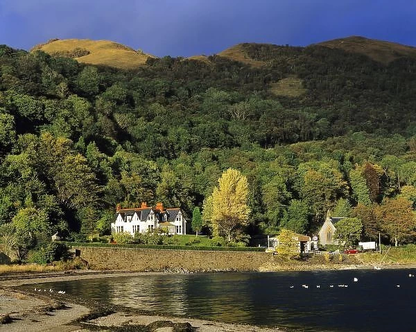 Scotland, Highland, Wester Ross, Onich. Afternoon sun highlights the buildings at