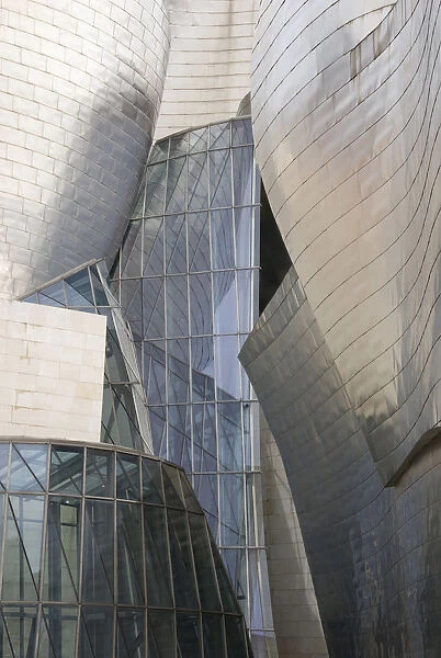 Spain, Bilbao. Guggenheim Museum designed by architect Frank Gehry, reflective titanium