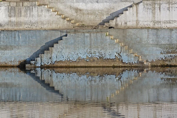 Steps mirrored on small lake, Jodhpur, India
