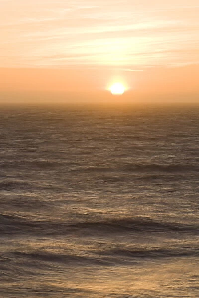 Sunset over the turbulent surf of the Pacific Ocean - San Francisco, California