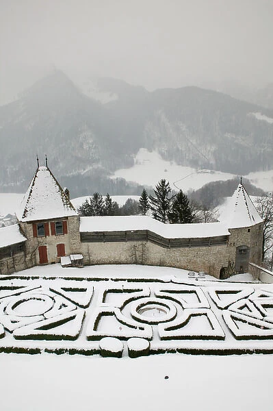 SWITZERLAND-Fribourg-GRUYERES: Castle Gardens under Snow: Gruyeres Castle  /  Winter