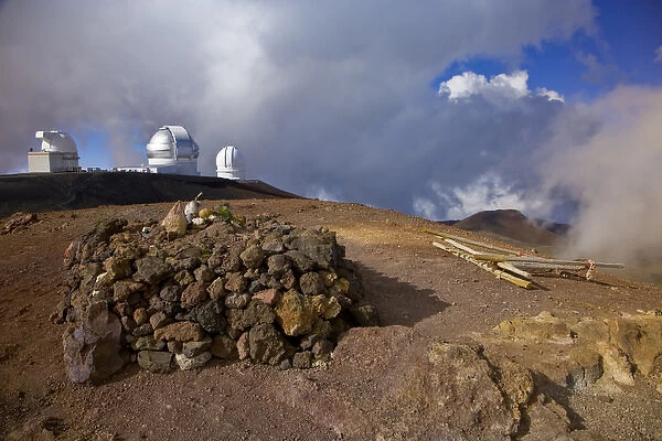 A traditional offering to the gods on the summit of Mauna Kea, with Keck Observatory