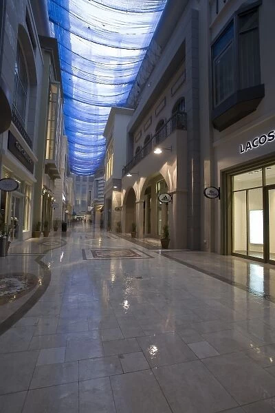 UAE, Dubai. Dubai Mall interior with rainwater on the floor