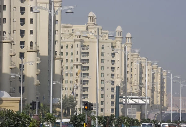 United Arab Emirates, Dubai. Apartment buildings next to main road in the Palm Jumeirah