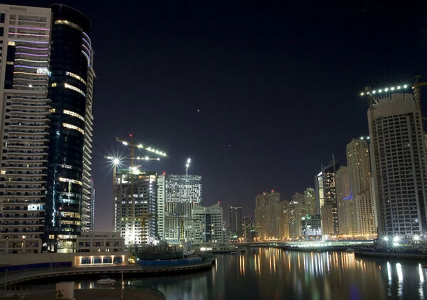 United Arab Emirates, Dubai. Towers on marina at night