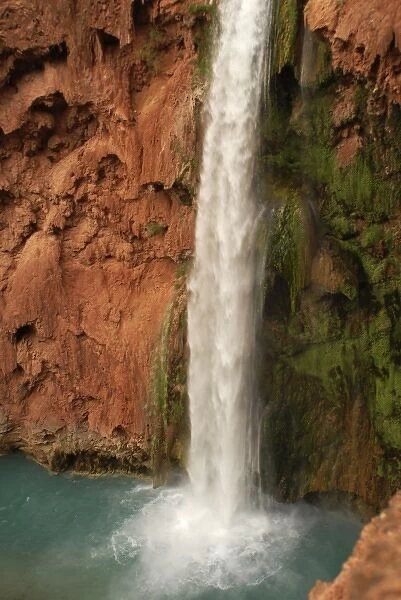 USA, Arizona, Havasu Canyon. Thundering Mooney Falls spills into the turquoise waters