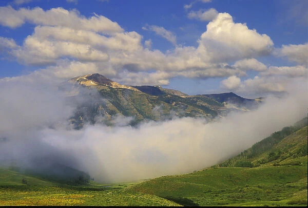 USA, Colorado, Crested Butte. Fog and mountain landscape