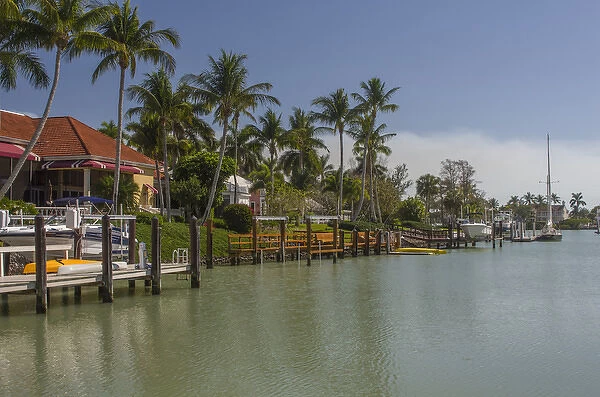 USA, Florida, Naples. Luxury homes in the Port Royal neighborhood line a canal by