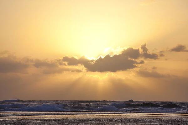 USA, Hawaii, Kauai. God rays over beach at sunset