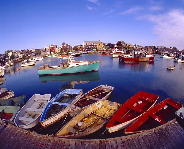 USA, Maine, Rockport. View of town buildings and colorful boats in bay. Credit as
