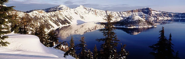 USA, Oregon, Crater Lake National Park, View of snow covered mountains with Crater lake