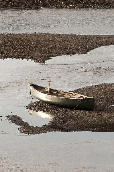 USA, WA, Bainbridge Island. Low tide in Fletcher Bay beaches canoe