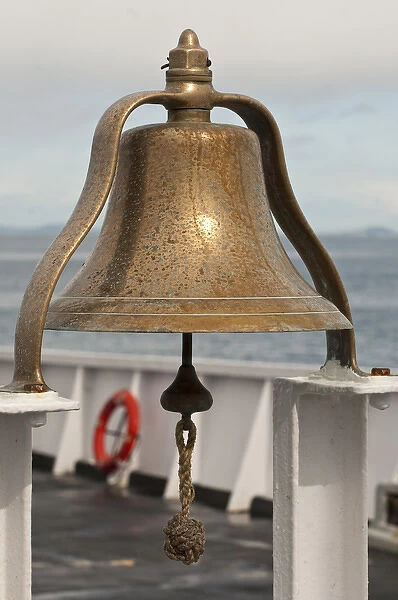 USA, WA, Brass ship bell on Blackball Coho ferry