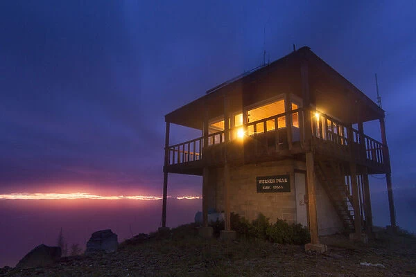 The Werner Peak Fire Lookout Tower at night in the Stillwater State Forest, Montana, USA