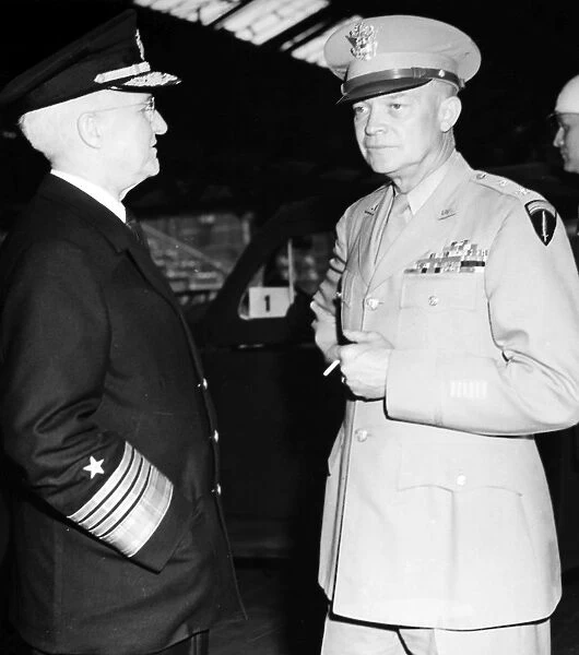 (1890-1969). 34th President of the United States. General Dwight D. Eisenhower (right) and Admiral Harold Stark awaiting President Truman en route to the Big Three meeting in Potsdam, Germany, 15 July 1945