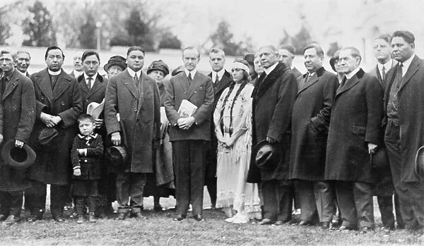 30th President of the United States. Coolidge (center) meeting with Ruth Muskrat, a Cherokee Native American, and others of the Committee of 100 on Indian Affairs, 1923
