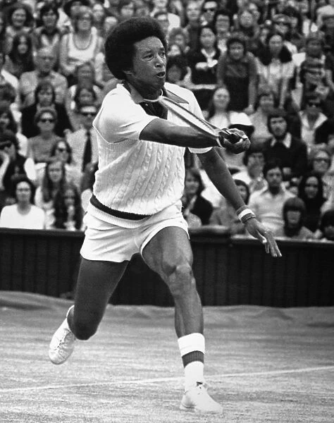 ARTHUR ASHE (1943-1993). American tennis player. Photographed during his match against Jimmy Connors in the mens singles final at Wimbledon, won by Ashe in four sets, 5 July 1975