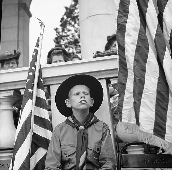 BOY SCOUT, 1943. A Boy Scout at a Memorial Day ceremony at Arlington National Cemetery