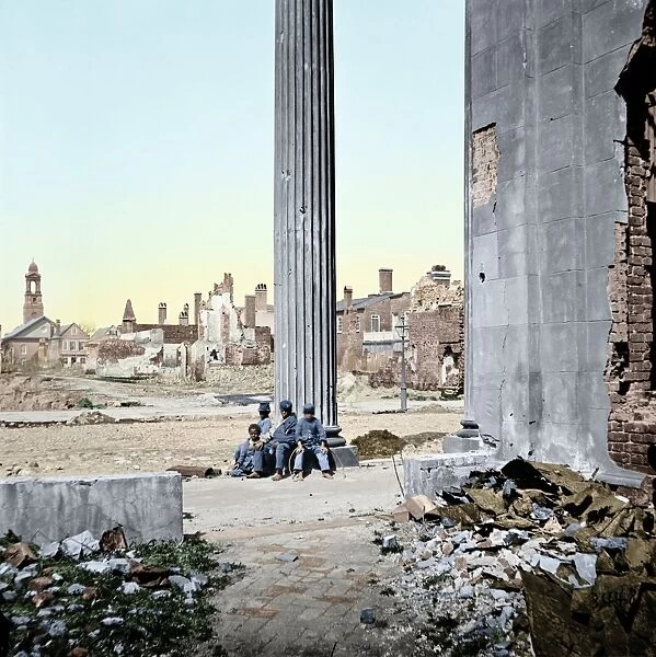 CIVIL WAR: CHARLESTON, 1865. Children sitting near ruined buildings and the porch of the Circular Church in Charleston, South Carolina, April 1865. Photographed by George N. Barnard