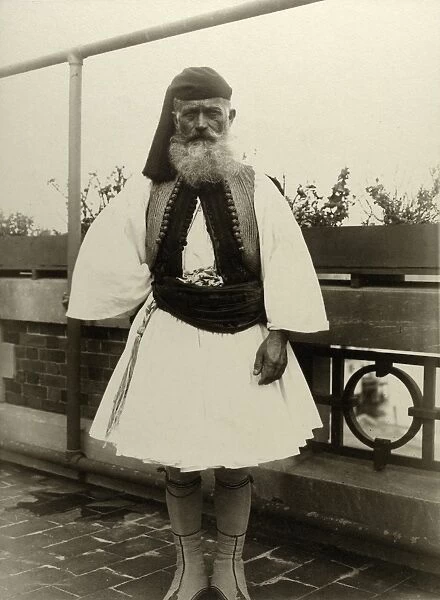ELLIS ISLAND: MAN, 1909. Portrait of a Greek man wearing the evzone uniform at Ellis Island