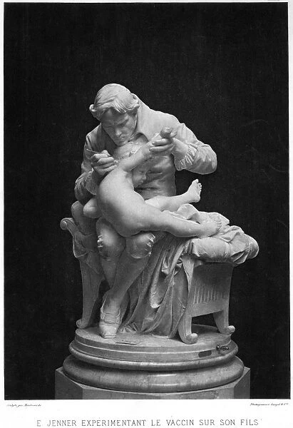 English physician. Jenner experimenting with smallpox vaccination on his son. French photogravure reproduction of a sculpture by Giulio Monteverde (1837-1917)
