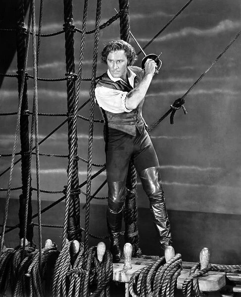 ERROL FLYNN (1909-1959). Australian actor. Flynn in the title role of The Sea Hawk, a 1940 film based on Rafael Sabatinis novel