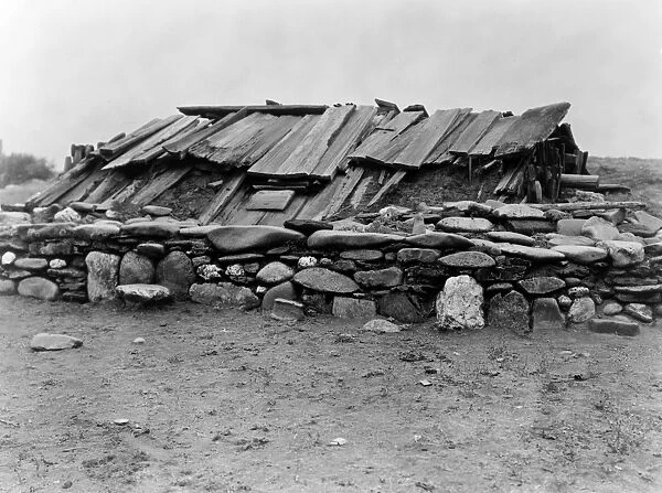 HUPA SWEAT LODGE, c1923. A sweat lodge, an underground building surrounded by a