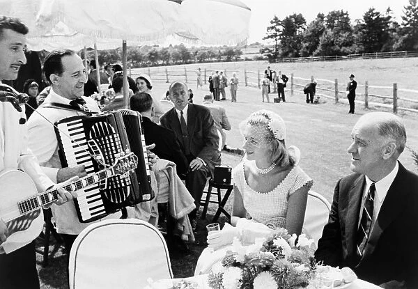 KENNEDY WEDDING, 1953. Guests and musicians at the wedding reception for the marriage of John F
