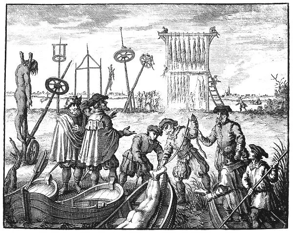 KILLING OF ANABAPTISTS. The killing of Anabaptists in Amsterdam, 1535. A dead Anabaptist hangs by his neck from a forked post before his body is dumped in the sea, while others are strung up by their heels. Line engraving from an 18th century English edition of John Foxes Book of Martyrs